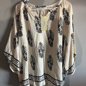 Chic Black and Cream Blouse